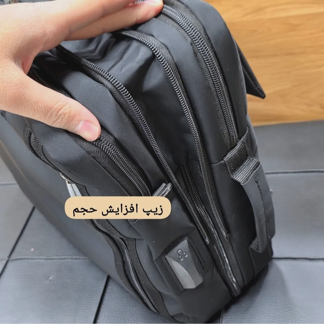 کیف اداری لپتاپی 3 کاره بنلتون جنس دیبا ضخیم رنگ مشکی