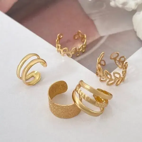 پک گوشواره دخترانه برنجی مدل ایرکاف چندتکه رنگ طلایی و نقره ای