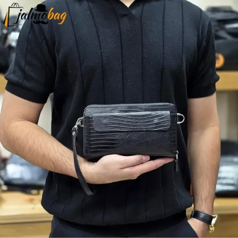 کیف دستی و دوشی چرم طبیعی ظفر دارای بند مچی و بند بلند قابل تنظیم