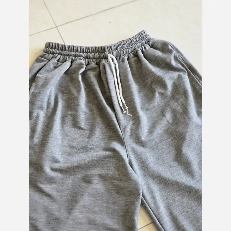 شلوار اسلش فول بگ پارچه ملانژ خنک رنگ طوسی و مشکی سایز بزرگ XXL و XXXL