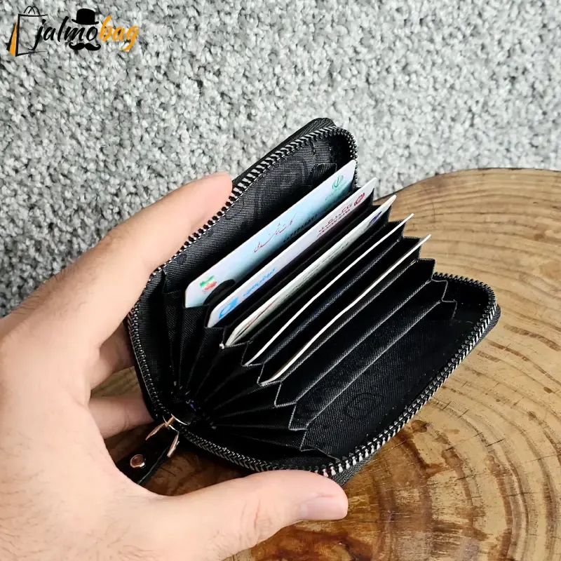 جاکارتی زیپدار چرم طبیعی گاوی مناسب آقایان و خانمها ابعاد 11 در 7 سانتیمتر (2)