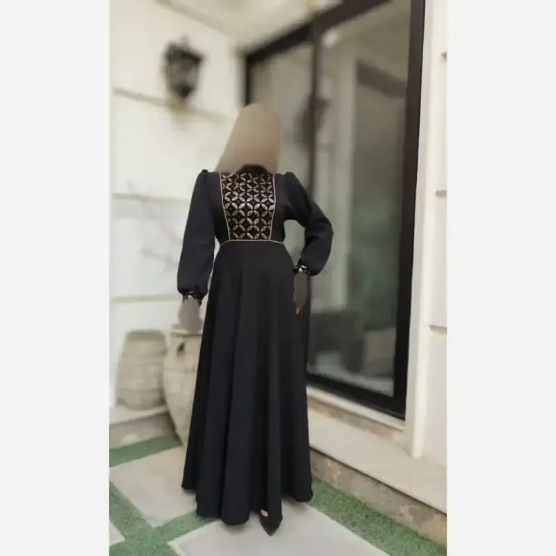 پیراهن زنانه طرح مهسا جنس کرپ مازراتی و خرجکار مخمل هندی رنگ مشکی
